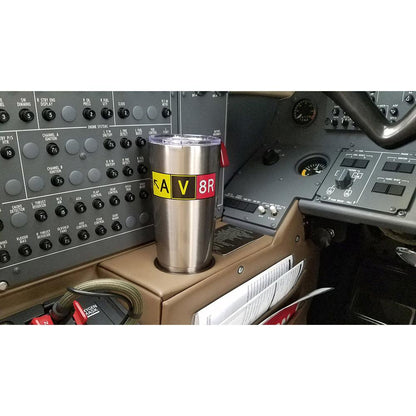 stainless av8r mug tumbler in cup holder inside airplane